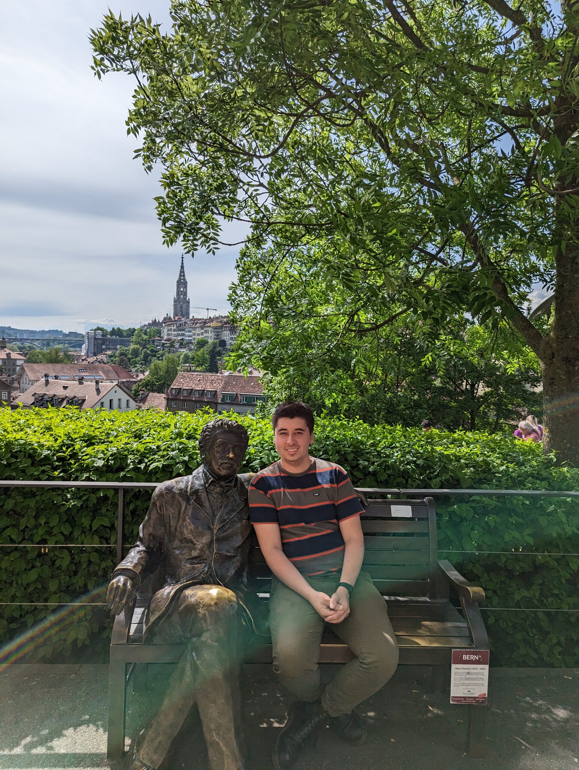 This is a picture of me sitting to the Albert Einstein statue in Bern, CH